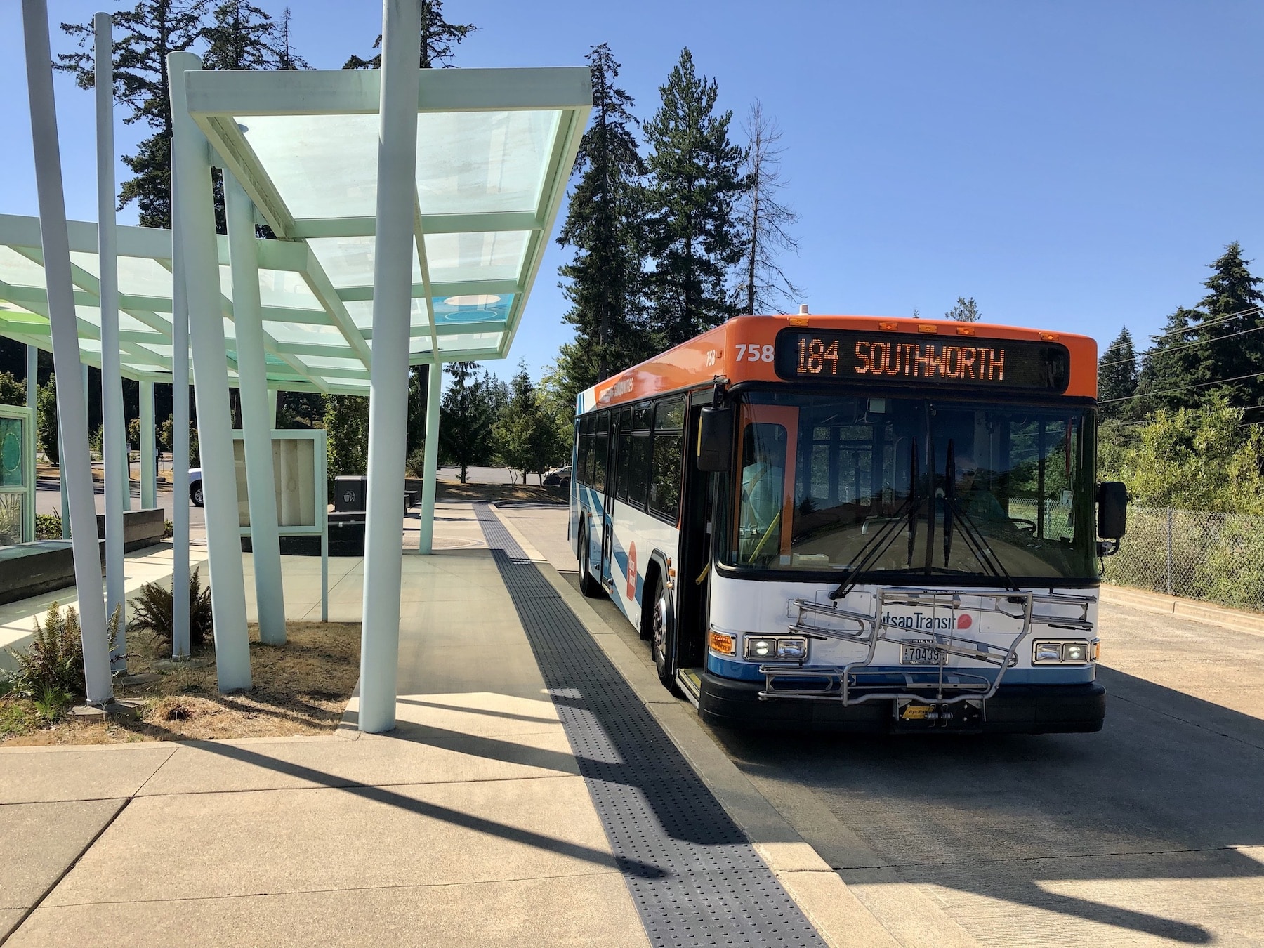 Kitsap Transit bus picks up passengers for the ferry at Harper Church park-and-ride.