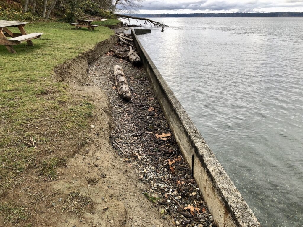 A bulkhead like this one built in the 1960s in which a wall is built and filled in behind would not be allowed to be built today, or probably even allowed to be refilled.