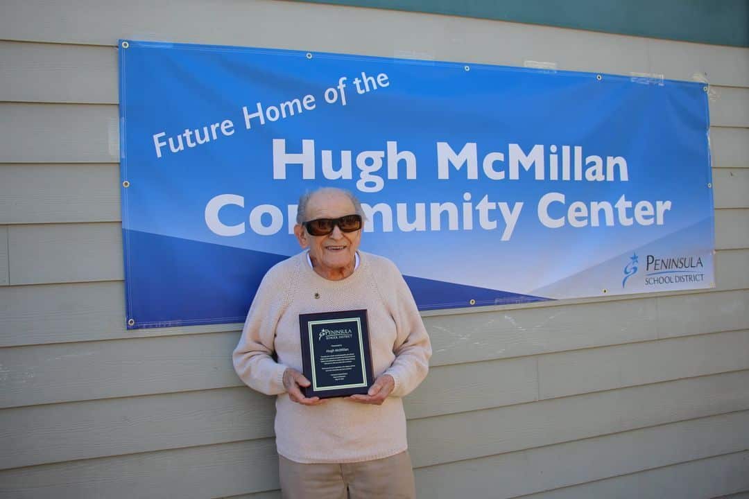 The Evergreen Elementary School gym was named the Hugh McMillan Community Center in June 2021.