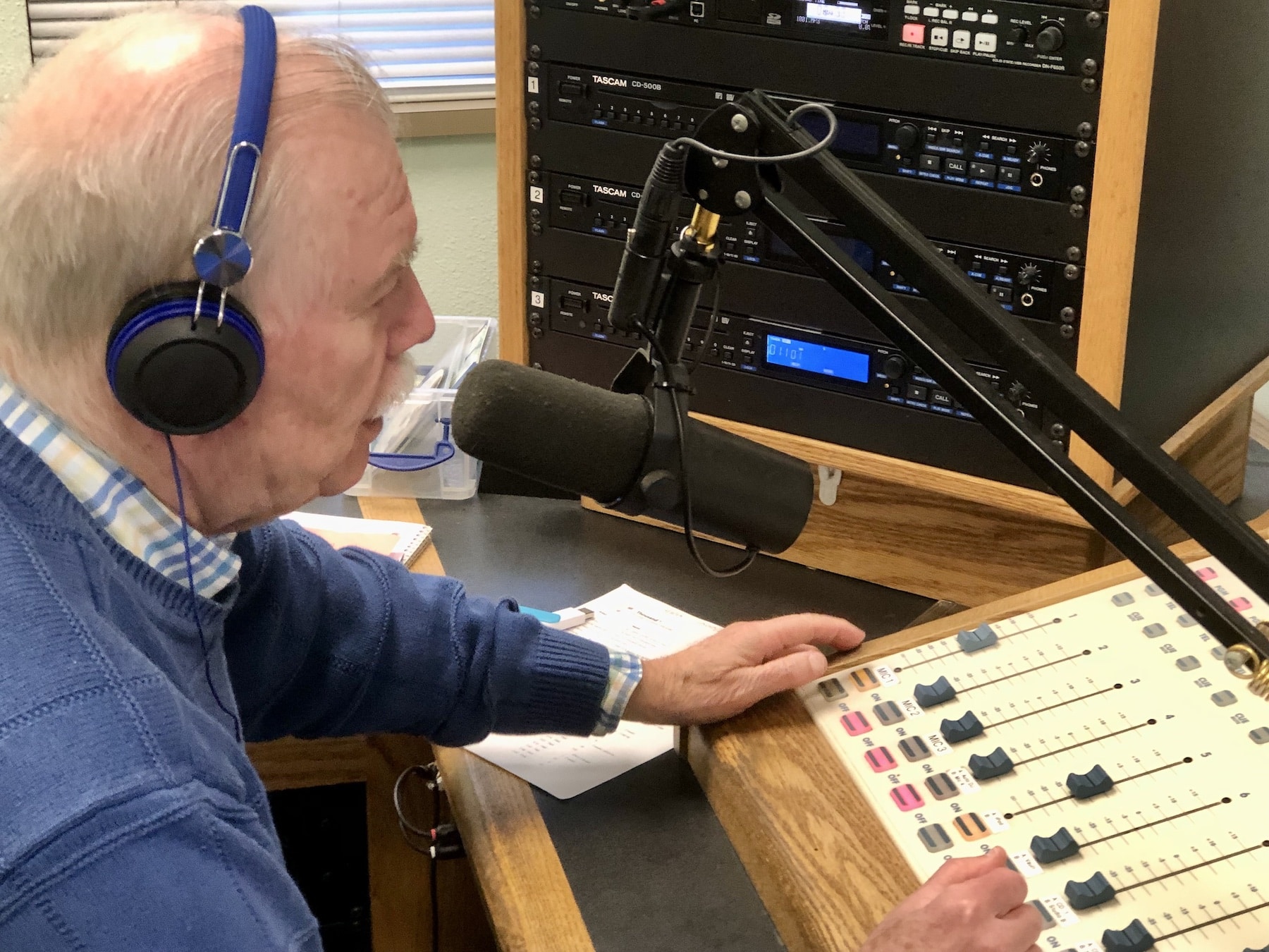 Denny Dale broadcasts his 1,000th show Monday, April 3, from the radio studio at Peninsula High.