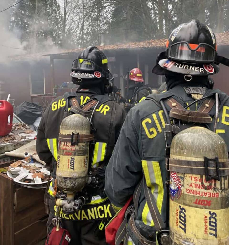 Gig Harbor Fire & Medic One firefighters battling a house fire