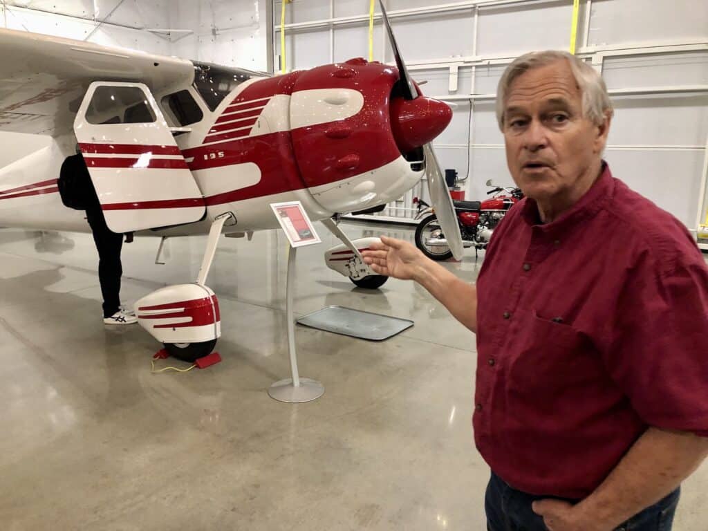 Bill Juranich with the 1953 Cessna 150, the Lear jet of its time. The four-seater is the "newest" plane in the collection.