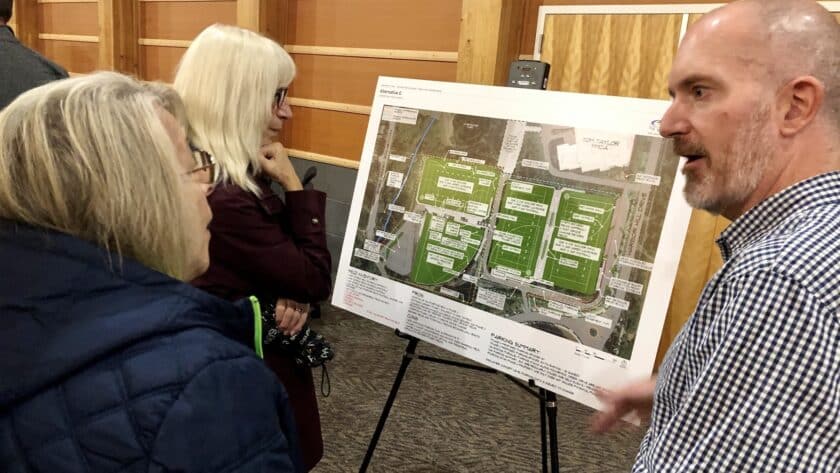 Sisters Carmela and Rosemary Micheli share their concerns about tree loss and parking with consultant Eric Streeby.