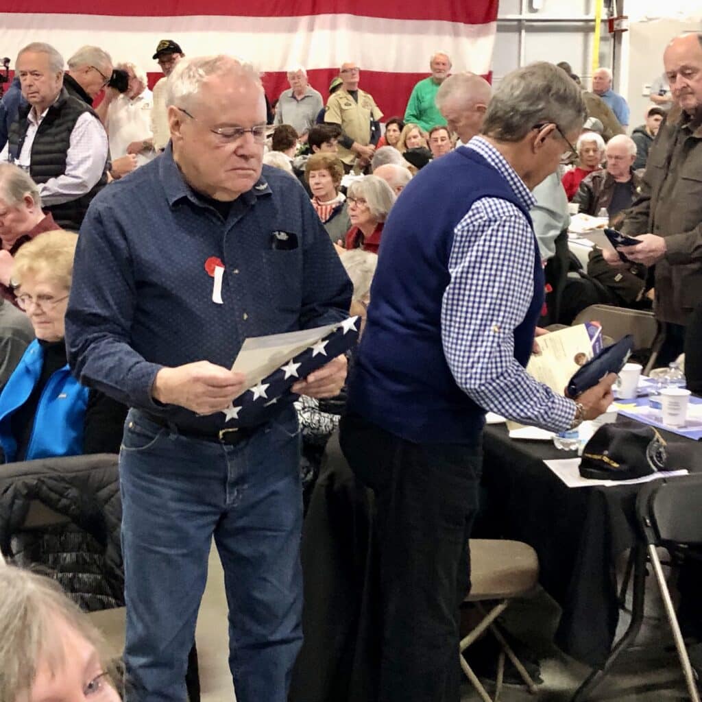 Vietnam veterans were presented American flags and Vietnam War Veteran lapel pins.