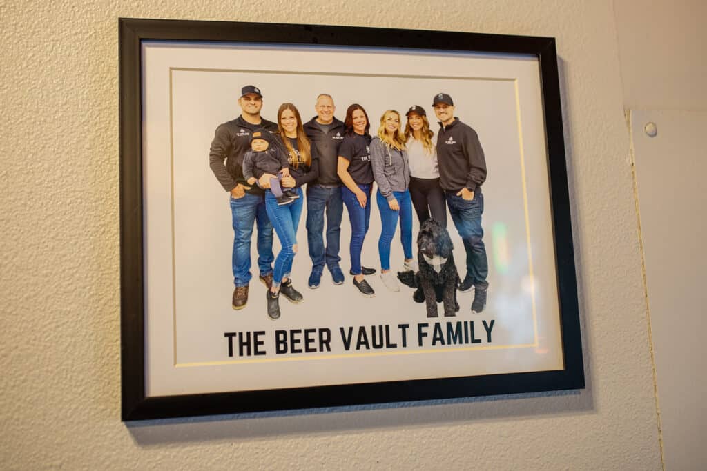 The Beer Vault family photo greets customers as they enter the tavern. Hal and Ronda Haase with their three daughters who all help out at the tavern; Hillari Figliola and her husband Cameron, Jori Wallace and her husband Eliott. a Bremerton firefighter, and the youngest is Ciera. Hal and Rhonda now have two grandsons, 2-year-old Walker (in photo), and baby Rhett, 6 months.