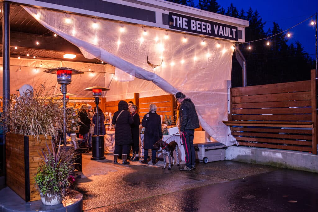 Night markets have gained immense popularity, attracting customers from throughout the area. The former drive-thru area at KeyBank, now a covered outdoor space, serves as an ideal, versatile location for local maker markets.