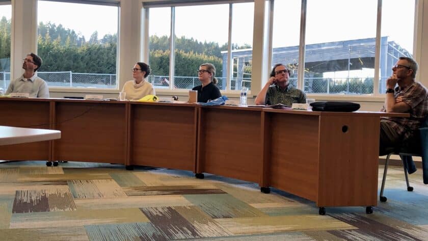 PenMet commissioners, from left, Billy Sehmel, Laurel Kingsbury, Missy Hill, Kurt Grimmer and Steve Nixon listen at Tuesday's board meeting. Steel beams for the new community recreation center are in the background.