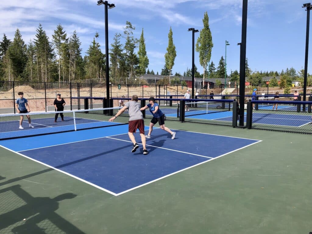 Players immediately hit the pickleball courts after the ceremony.