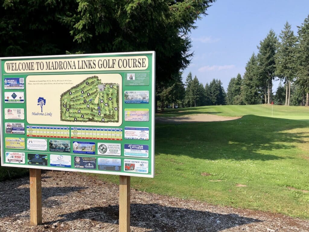 Madrona Links layout sign with sponsors.