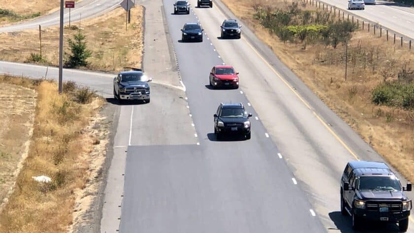 A car enters westbound Highway 16 from Wollochet Drive. A 2018 WSDOT study recommended extending the acceleration lanes within 10 years.